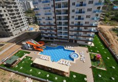 Продажа квартиры 1+1, 65 м2, до моря 500 м в районе Махмутлар, Аланья, Турция № 1312 – фото 1