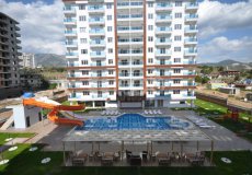 Продажа квартиры 1+1, 65 м2, до моря 500 м в районе Махмутлар, Аланья, Турция № 1312 – фото 2