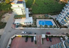 Продажа квартиры 1+1, 65 м2, до моря 400 м в районе Махмутлар, Аланья, Турция № 1424 – фото 29