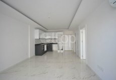 Продажа квартиры 1+1, 65 м2, до моря 250 м в районе Махмутлар, Аланья, Турция № 1455 – фото 25