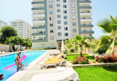 Продажа квартиры 1+1, 65 м2, до моря 350 м в районе Махмутлар, Аланья, Турция № 2318 – фото 1