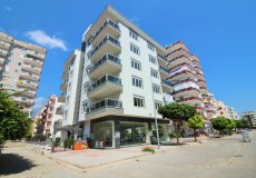 Продажа квартиры 1+1, 65 м2, до моря 300 м в районе Махмутлар, Аланья, Турция № 2382 – фото 1