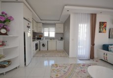 Продажа квартиры 1+1, 80 м2, до моря 330 м в районе Махмутлар, Аланья, Турция № 2772 – фото 23