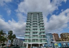 Продажа квартиры 1+1, 60 м2, до моря 10 м в районе Махмутлар, Аланья, Турция № 4497 – фото 1