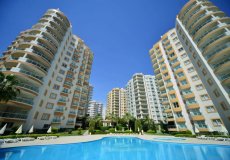Продажа квартиры 1+1, 60 м2, до моря 400 м в районе Махмутлар, Аланья, Турция № 4649 – фото 1