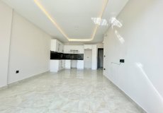 Продажа квартиры 1+1, 65 м2, до моря 300 м в районе Махмутлар, Аланья, Турция № 5983 – фото 20