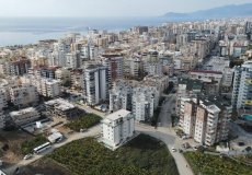 Продажа квартиры 1+1, 50 м2, до моря 500 м в районе Махмутлар, Аланья, Турция № 7800 – фото 1