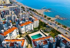 Продажа квартиры 2+1, 85 м2, до моря 50 м в районе Тосмур, Аланья, Турция № 7661 – фото 1