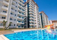 Продажа квартиры 1+1, 65 м2, до моря 400 м в районе Махмутлар, Аланья, Турция № 8311 – фото 1