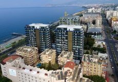 Продажа квартиры 2+1, 75 м2, до моря 20 м в районе Махмутлар, Аланья, Турция № 8049 – фото 1