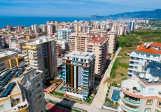 Продажа квартиры 1+1, 70 м2, до моря 500 м в районе Махмутлар, Аланья, Турция № 8814 – фото 1