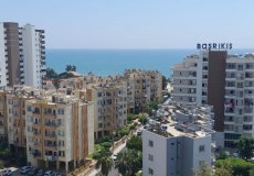 Продажа квартиры 1+1, 50 м2, до моря 200 м в районе Томюк, Мерсин, Турция № 8926 – фото 1