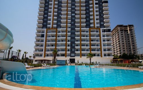 ID: 8927 1+1 Apartment, 75 m2 in Tomuk, Mersin, Turkey 