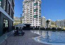 Продажа квартиры 1+1, 50 м2, до моря 1300 м в районе Махмутлар, Аланья, Турция № 9201 – фото 1